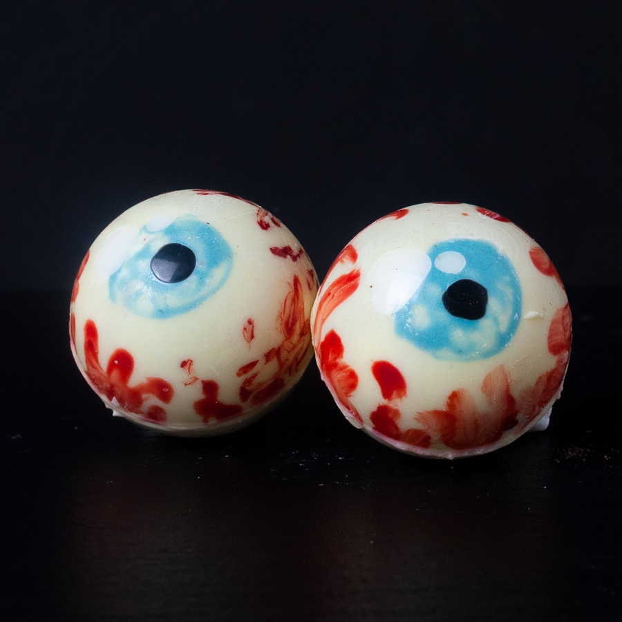 Eyeball hot chocolate bombs with blue centres.